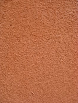 Texture of red concrete wall background 
