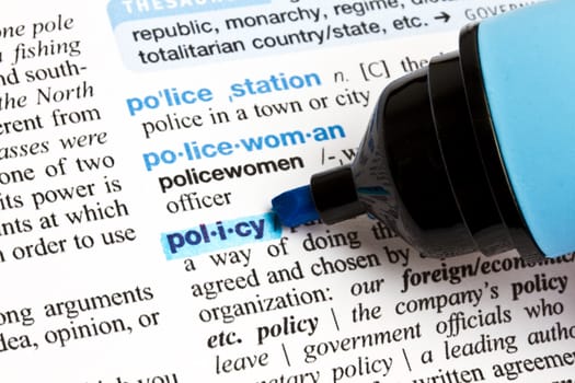 The word "Policy" highlighted in a dictionary