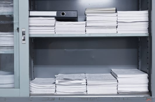 Old file cabinet. Documents for use on the floor.