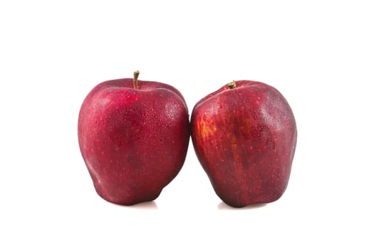 Red apple fruits on white background