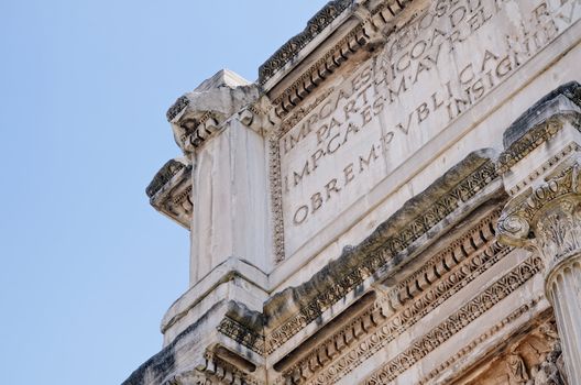 Detail of the main arch of Titus on the Via Sacra in Rome