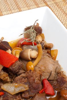 Homemade beef stew with mushrooms, traditional goulash