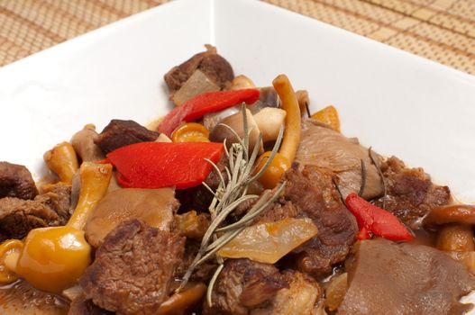 Homemade beef stew with mushrooms, traditional goulash