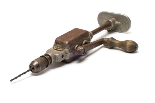Old hand drill on a white background.
