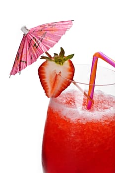 Strawberry daiquiri in glass isolated on white background with umbrella