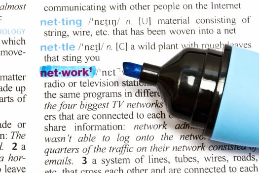 The word " NETWORK" highlighted in a dictionary