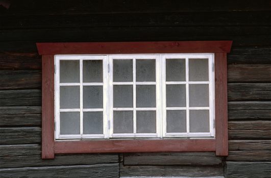 Old window and wooden wall 