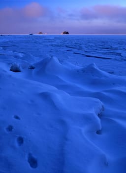 Beautiful blue ice floating in the lake 