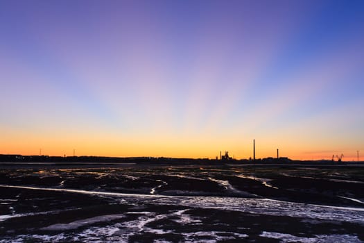 Sunset on Tejo river during low tide.