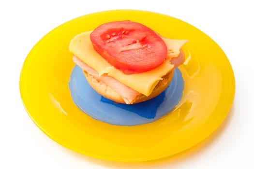 Colorful sandwich on the yellow plate