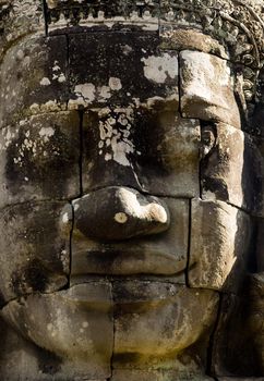 Ancient buddhist khmer statue in Angkor Wat, Cambodia . Bayon Temple.