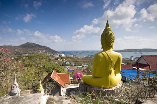 Giant Buddha with Ko Si Chang island panorama in Thailand