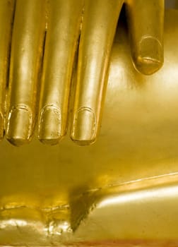 Hand of gold buddha statute in Bangkok, Thailand