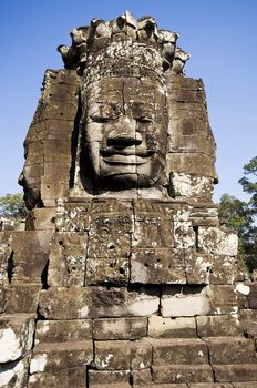 Ancient buddhist khmer statue in Angkor Wat, Cambodia . Bayon Temple.