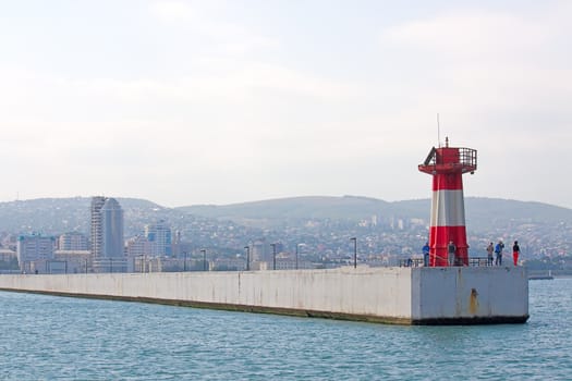 At entrance to port of Lighthouse on shores of Black Sea, Novorossiysk, Russia.