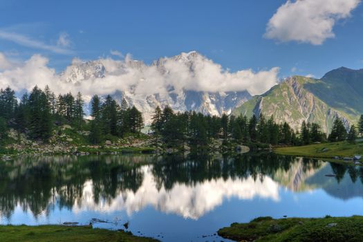 summer view of Arpy lake near La Thuile, Aosta valley, Italy. Image processed with hdr technique