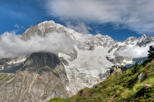 summer view Mont Blanc from Veny valley, Courmayeur, Italy.