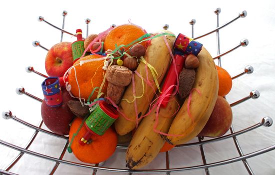 Fruit at a party on a plain white background.