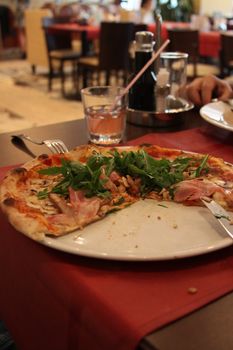 Close up the pizza on a plate.