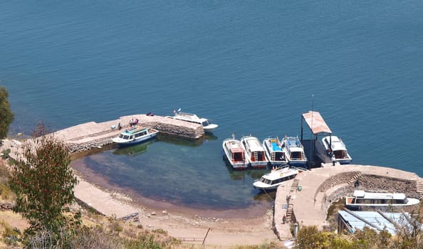 small harbor on the shore of Titicaca lake, Peru