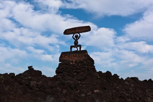 This sign at the entrance to National Park Timanfaya on Lanzarote. It shows how wild landscape of the park is composed of lava and the remains of volcanoes.