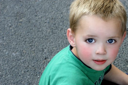 Looking down towards little boy and street