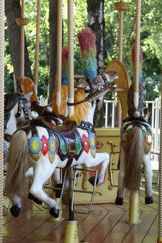 Carousel ride close up in an amusement park.