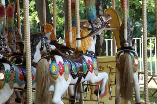 Carousel ride close up in an amusement park.