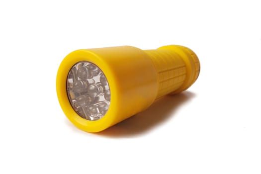 Yellow LED Flashlight isolated on white background