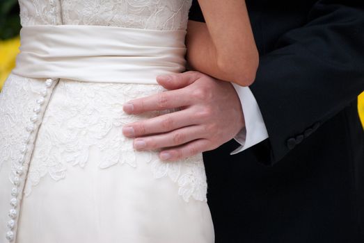 Bride and Groom showing Affection