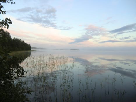 Sunrise over lake on the river Keret in Karelia