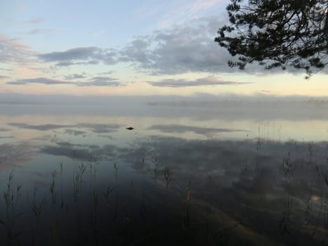 Sunrise over lake on the river Keret in Karelia