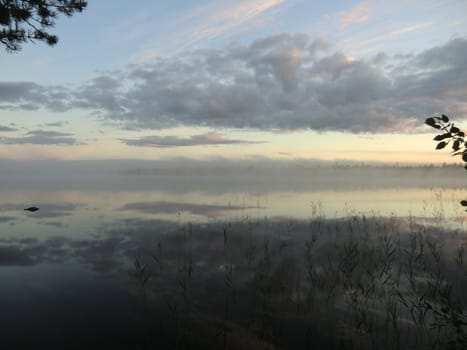 Sunrise over lake on the river Keret in Karelia