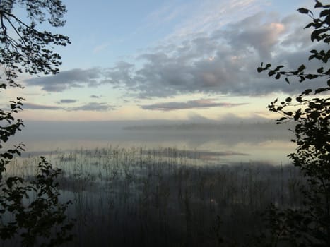 Sunrise over lake on the river Keret in Karelia