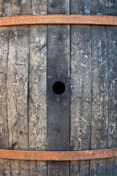 Old barrel made of wood used for Italian wine production