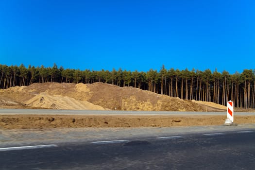 Industrial road works under the new motorway
