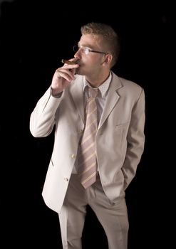 Businessman smoking cigar