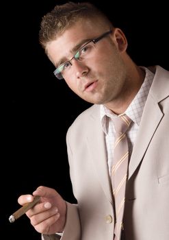 Businessman smoking cigar