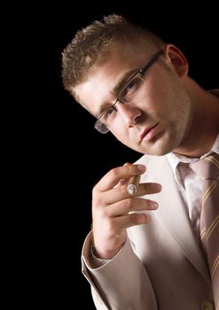 Businessman smoking cigar