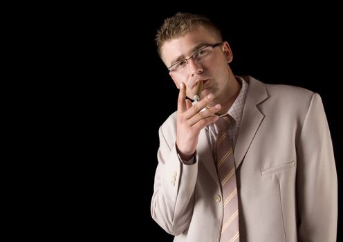 Businessman smoking cigar