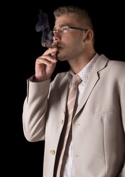 Businessman smoking cigar