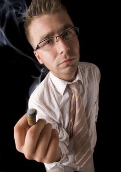 Businessman smoking cigar