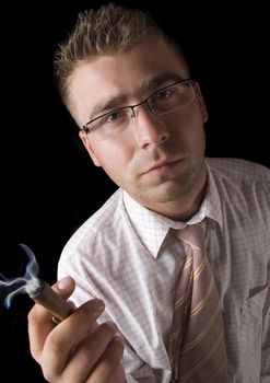 Businessman smoking cigar