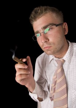 Businessman smoking cigar