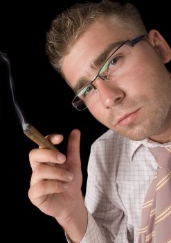 Businessman smoking cigar