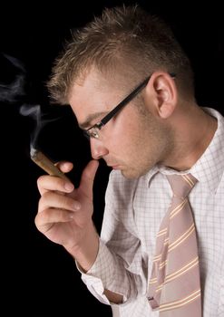 Businessman smoking cigar