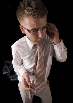 Businessman smoking cigar