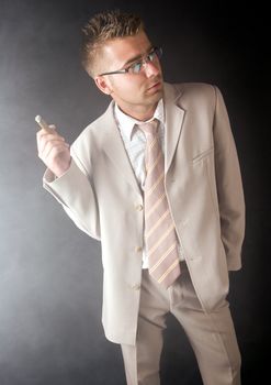 Businessman smoking cigar