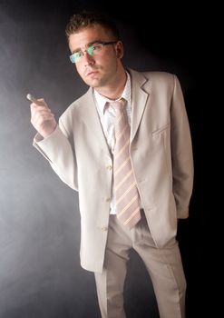 Businessman smoking cigar