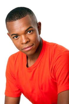 Portrait of a handsome young man in red orange shirt, isolated.